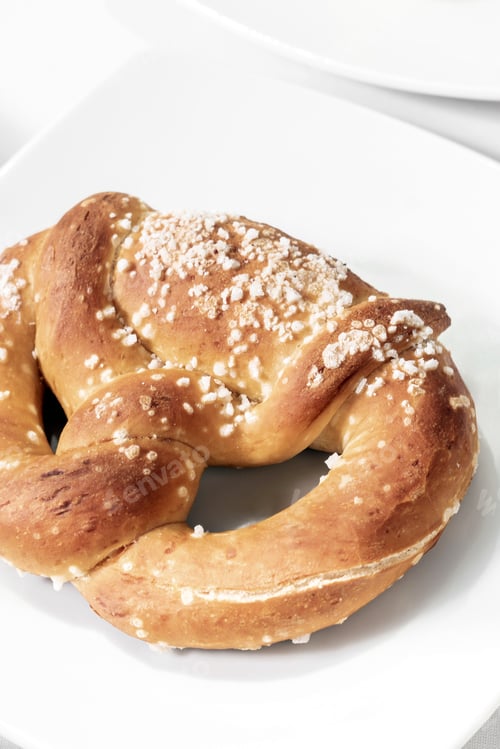 Preview: vegan dairy-free organic german pretzel bread on white table