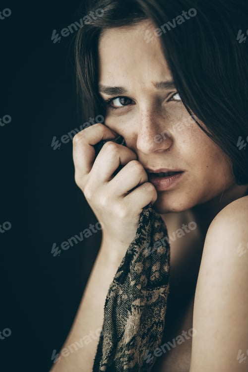Preview: Young woman sad look