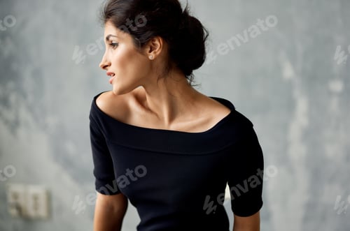 Preview: attractive woman in black dress decoration posing close-up