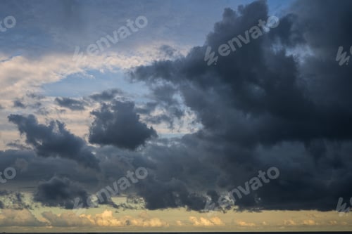 Preview: Storm clouds over the sea at sunset