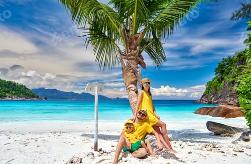 Preview: Family with three year old boy on beach. Seychelles, Mahe.