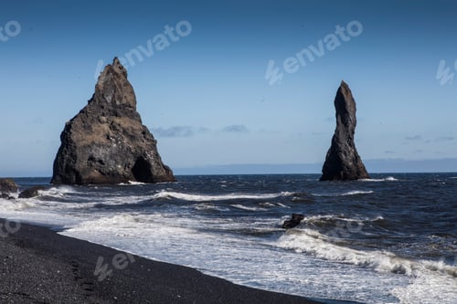 Preview: Basalt rock formations Troll toes on black beach. Reynisdrangar, Vik, Iceland
