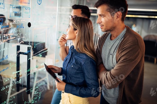 Preview: Company employees working in software development and designer office