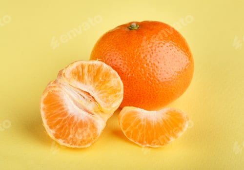 Preview: Ripe Mandarin Close-Up On A White Background. Tangerine Orange. Colorful Food And Drink Still Life