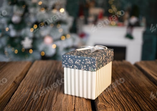 Preview: gift boxes in front of Christmas tree