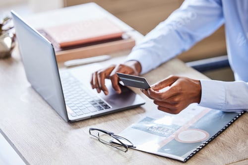 Preview: Credit card, laptop and finance with hands of businessman for investments, savings or online shoppi