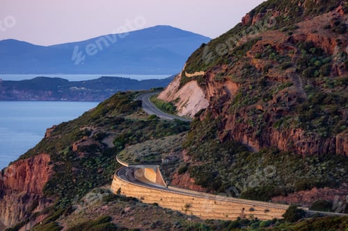 Preview: Scenic Highway on the Sea Coast during Sunny Fall Season Sunset. Sardinia, Italy.