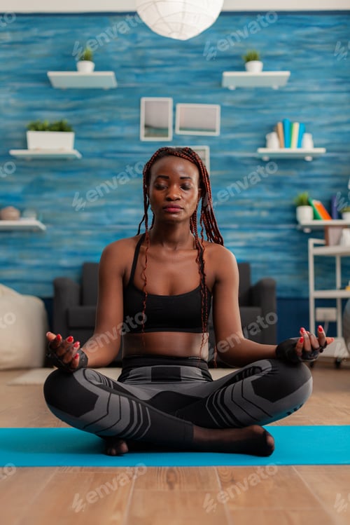 Preview: Black woman training body and mind meditating