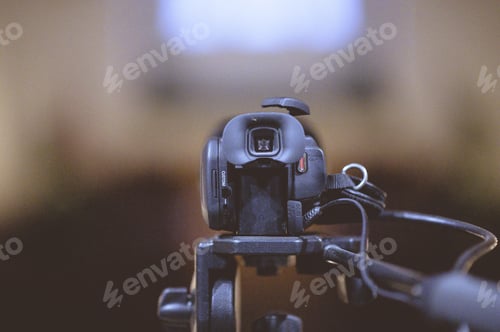 Preview: Closeup shot of a camera inside a building with a blurred background