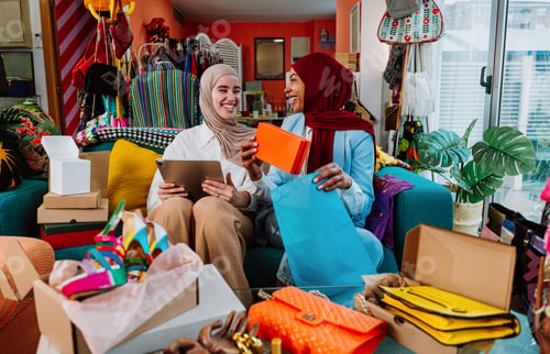 Preview: Diverse women collaborating on online fashion retail business