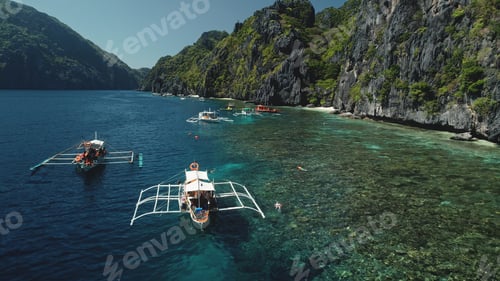 Preview: Closeup summer vacation on passenger boats at ocean. Amazing landscape of Philippines cliff shore