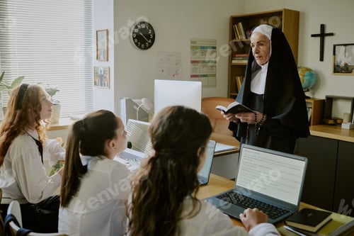 Preview: Discussing Assignment in Classroom with Nun and Students
