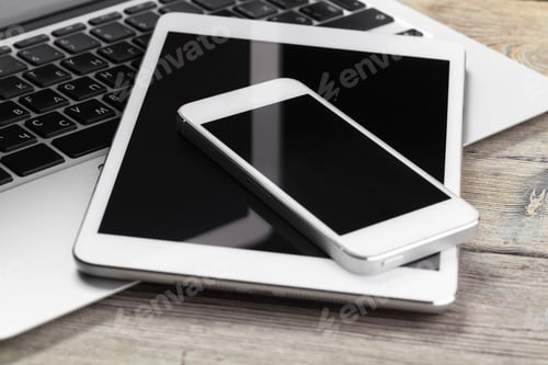 Preview: Open laptop with digital tablet and smartphone close up
