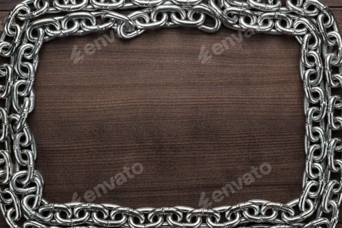 Preview: Chain Frame On The Wooden Background