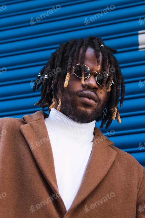 Preview: Black man in trendy sunglasses in city