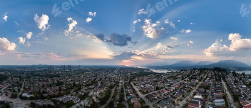 Preview: Panoramic Aerial View of Burnaby Skyline at Sunset with Dramatic Clouds