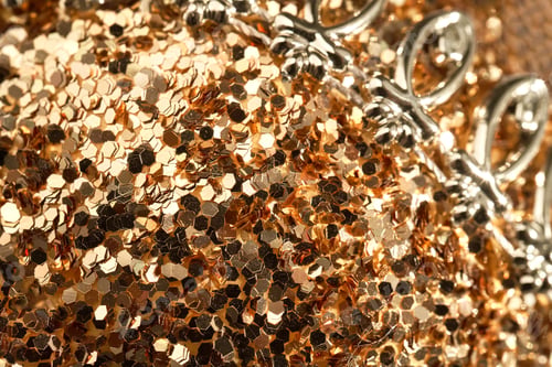Preview: The surface of a Christmas ball in glitter close-up.
