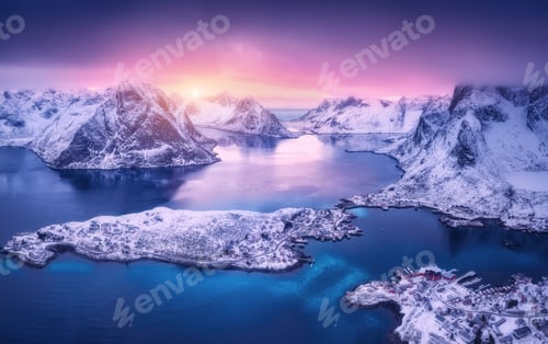 Preview: Aerial view of beautiful snowy islands, village, sea, mountains