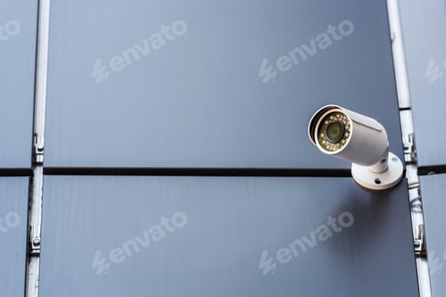 Preview: security camera on wall of office building, security system concept