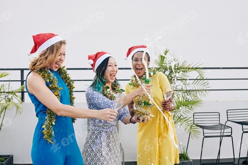 Preview: Women opening splashing champagne