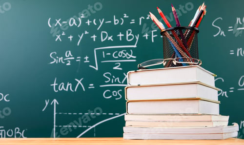 Preview: Books, and pencils on the desk by the blackboard