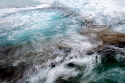 Preview: Stone shore with ladder between water
