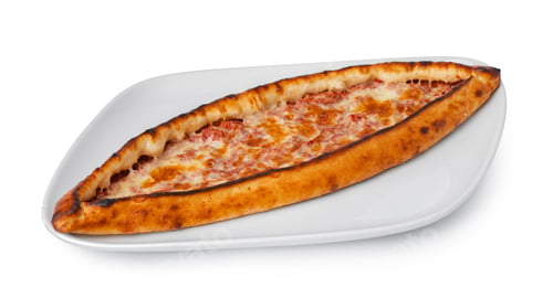 Preview: Turkish boat-shaped flatbread pide isolated on white
