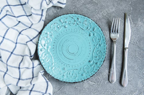 Preview: empty plate on tablecloth