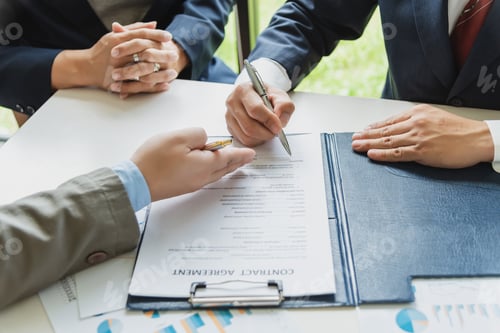 Preview: Businessman sign the contract, the agreement in the document.