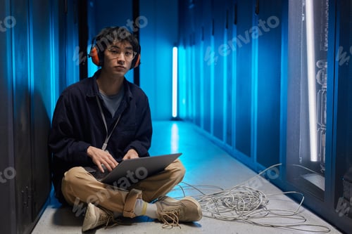 Preview: Asian Network Engineer in Server Room