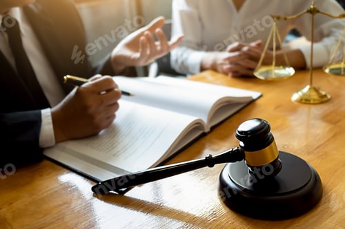 Preview: Judge gavel with Justice lawyers having team meeting at law firm background