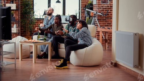 Preview: African american man playing games with vr headset