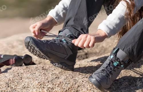Preview: Close up of the laces on a female hiker's shoes