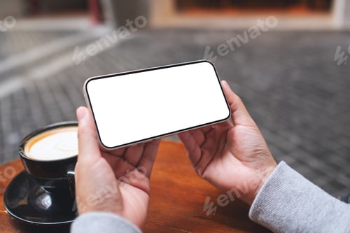 Preview: Mockup image of a woman holding mobile phone with blank desktop screen