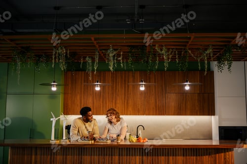 Preview: Interracial ecology engineers collaborating on sustainable project.