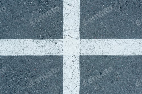 Preview: top view of white parking lines on grey roadway background