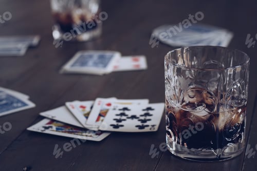 Preview: Staying in, game night, playing cards with drinks