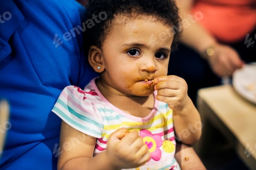 Preview: Brazilian toddler girl eating