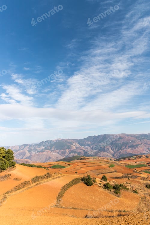 Preview: beautiful red land against a blue sky in dongchuan district, kunming city,yunnan