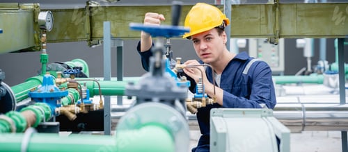 Preview: An industry engineer is inspecting the industry cooling tower air conditioner.