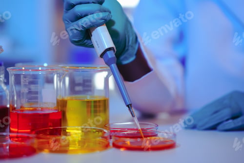 Preview: Asian female scientist passionately conducts experiments in a laboratory