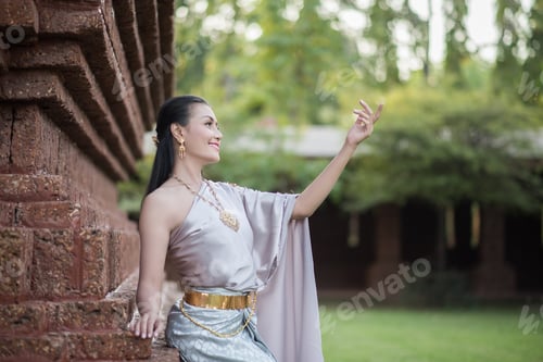 Preview: Beautiful Woman wearing typical Thai dress