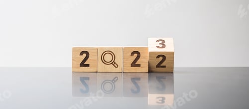 Preview: 2023 block with magnifying glass icon.