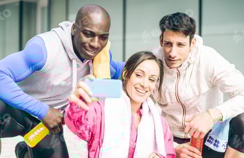 Preview: Group of urban runners making a break and taking some rest