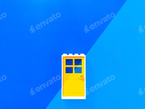 Preview: Yellow door on blue shaded background