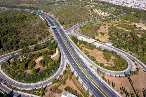 Preview: Aerial drone view of regional highway of Hymettus mountain, Greece, Athens city background.
