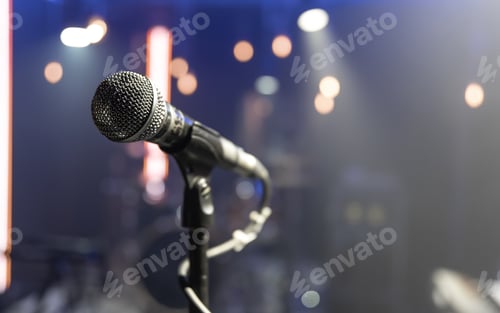 Preview: Close up microphone on blurred background with bokeh.