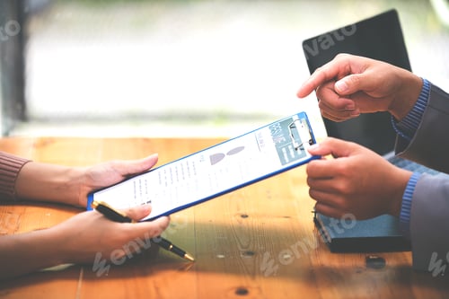 Preview: Woman submits her employer's resume to review job applications. Concept showcases her ability to get