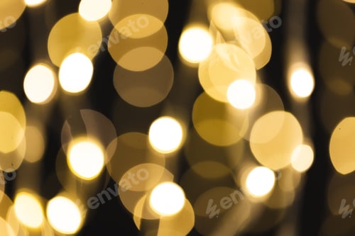 Preview: Multiple yellow bokeh lights with copy space on dark background