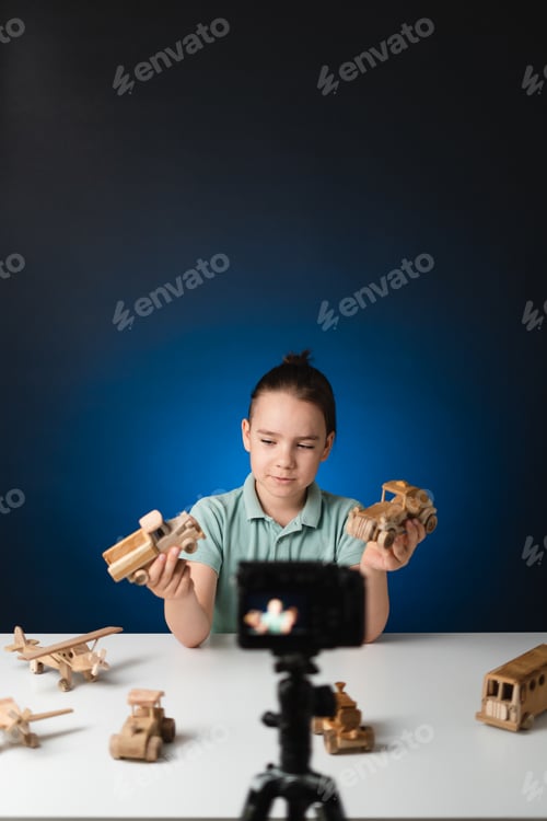 Preview: Young boy video blogger making stream with his followers